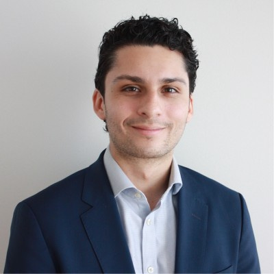 Kevin Alvarez in a navy suit
